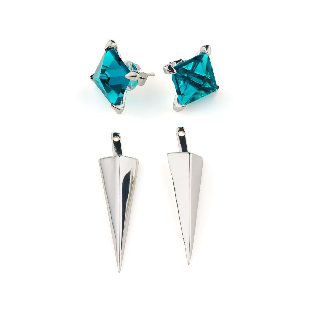 Pair of turquoise square stud earrings and two silver spike pendants on a white background